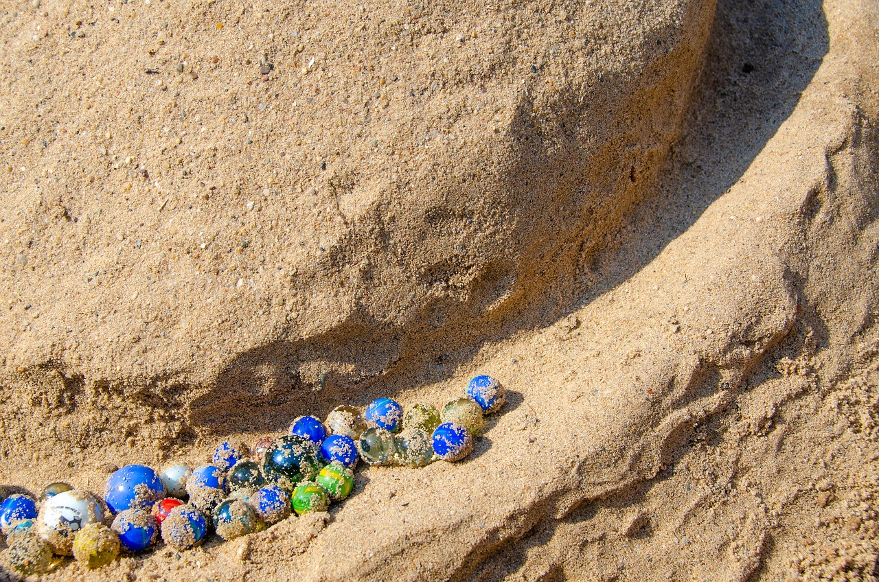 Le vere regole del gioco delle biglie in spiaggia