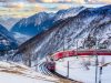 il-trenino-rosso-del-bernina-in-inverno-nei-pressi-di-alp-gruem